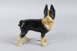 A CAST IRON BLACK AND WHITE DOG. 8ins high.