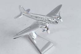 A CHROME DAKOTA ORNAMENT. 5ins high.