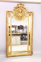 A LARGE LOUIS XVITH STYLE GILTWOOD MIRROR. 7ft high x 3ft 4ins wide.