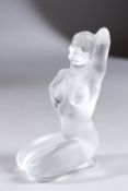 A LALIQUE GLASS KNEELING NUDE, etched Lalique, France. 5ins high, boxed.