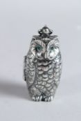 A SILVER PLATED EMERALD EYE OWL DOUBLE SOVEREIGN CASE.