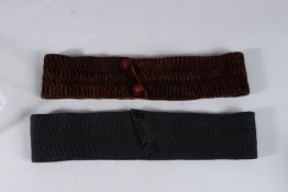 TWO NIGIA BELTS.