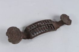 A CHINESE BRONZE SCEPTRE. 12ins high.