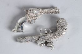 TWO SILVER PLATED GUN VESTAS.