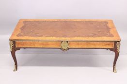 A LOUIS XVITH STYLE RECTANGULAR TOP COFFEE TABLE with inlid top, on four curving legs. 3ft long x