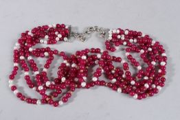 CULTURED PEARL AND RUBY BEADS.