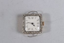 AN 18CT GOLD AND PLATINUM COCKTAIL WATCH.