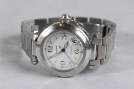 A CARTIER STAINLESS STEEL AUTOMATIC WRISTWATCH in a Cartier box, No. CC702694.
