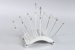 A CHRISTOPHER DRESSER DESIGN PLATED SIX DIVISION TOAST RACK. 8.5ins long.