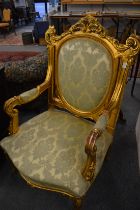 A GOOD PAIR OF DECORATIVE GILT FRAMED OPEN ARMCHAIRS with classical style upholstery.