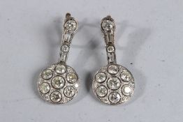 A PAIR OF EDWARDIAN LARGE DIAMOND DROP EARRINGS with platinum setting, 18ct fittings and 7ct