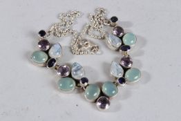 A SILVER. MOONSTONE, AMETHYST AND IOLITE NECKLACE.