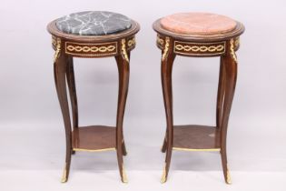 A PAIR OF LOUIS XVITH STYLE CIRCULAR MARBLE TOP TABLES with curving legs and under-tier. 4ft 3ins
