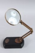 A MAGNIFYING GLASS on a stand.
