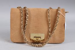 A STUART WEITZMAN for RUSSELL & BROMLEY TAN BAG.