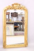 A LOUIS XVITH STYLE GILTWOOD MIRROR with foliage. 5ft high x 2ft 8ins wide.