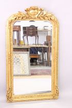 A LOUIS XVITH STYLE GILTWOOD MIRROR with foliage. 5ft high x 2ft 8ins wide.