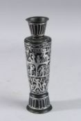 A SILVER INLAID VASE. 8.5ins high.