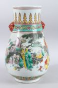 A LARGE CHINESE PORCELAIN VASE painted with figures. 15ins high.