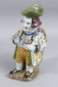 A FRENCH TOBY JUG. 10ins high.