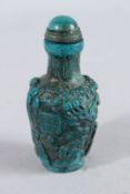 A CHINESE TURQUOISE SNUFF BOTTLE AND STOPPER. 3.5ins high.
