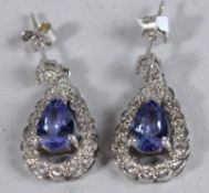 A PAIR OF TANZANITE AND DIAMOND DROP EARRINGS.