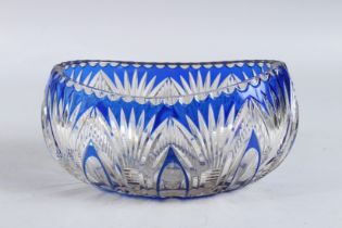 A BLUE CUT GLASS OVAL BOWL.