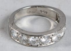 A PLATINUM EIGHT STONE DIAMOND RING, approx. 3ct diamonds.