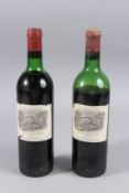CHATEAU LAFITE ROTHSCHILD 1976, two bottles, various levels.