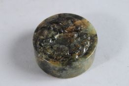 A JAPANESE ROUND JADE SEAL. 2ins diameter.
