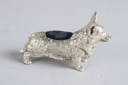 A LARGE SILVER PLATED CORGI PIN CUSHION.