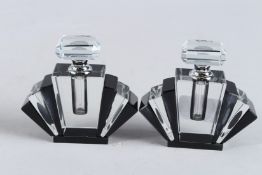 A SMALL PAIR OF BLACK ART DECO DESIGN SCENT BOTTLES. 3ins hgh.