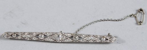 A PLATINUM AND DIAMOND ART DECO BAR BROOCH.
