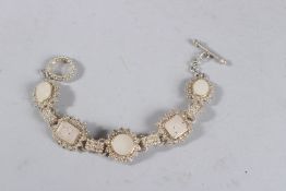 A SILVER MOONSTONE SET BRACELET.