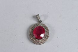 A RUBY AND DIAMOND PENDANT.