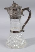 A VERY GOOD VICTORIAN GLASS AND SILVER MOUNTED CLARET JUG cast with fruiting vines, in a fitted