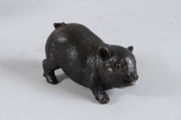 A SMALL BRONZE PIGLET. 5ins long.