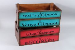 A PAIR OF WOODEN CHAMPAGNE BOXES.