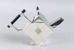 A CHRISTOPHER DRESSER DESIGN PLATED SQUARE WITH A HOLE TEAPOT.