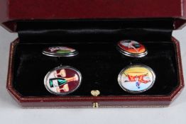 A SILVER AND ENAMEL FOUR VICES CUFFLINKS.