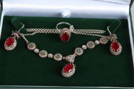 A SILVER GILT CHYRSOPHASE NECKLACE AND EARRING SET.