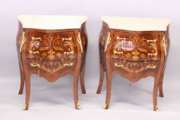 A GOOD PAIR OF SMALL MARBLE TOP THREE DRAWER MARQUETRY COMMODES with gilt metal mounts, on curving