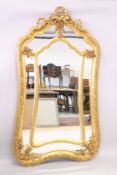 A LARGE LOUIS XVITH STYLE GILTWOOD MIRROR. 6ft 6ins high x 3ft 4ins wide.