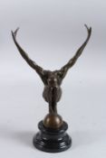 A BRONZE DIVER. Signed, on a cirular marble basse. 11ins high.