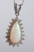 AN OPAL AND DIAMOND PENDANT.
