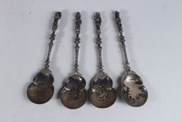A SET OF FOUR VICTORIAN SILVER APOSTLE SPOONS. London 1878.