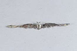 A SILVER BAT BROOCH.