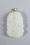 A SILVER TOP CHINESE WHITE JADE PENDANT.