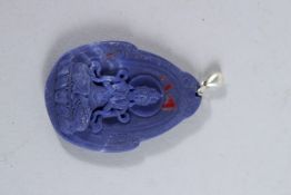 A SILVER TOP CHINESE LAVENDER JADE PENDANT.