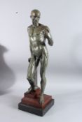 A VERY GOOD BRONZE ANATOMICAL MAN nude standing bedside a pillar, on a marble base. 27ins high.